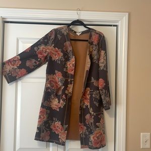 Knee length, faux suede cardigan/jacket. Red, brown, gray.